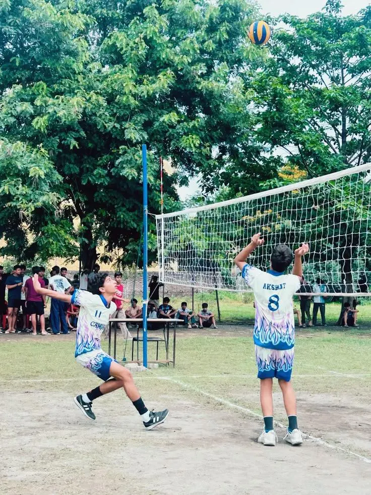 Intense volleyball match action during a group-sponsored tournament